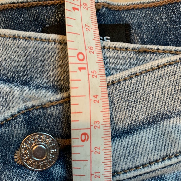 Express light wash crossover skinny jeans. Size 2. - Picture 8 of 9